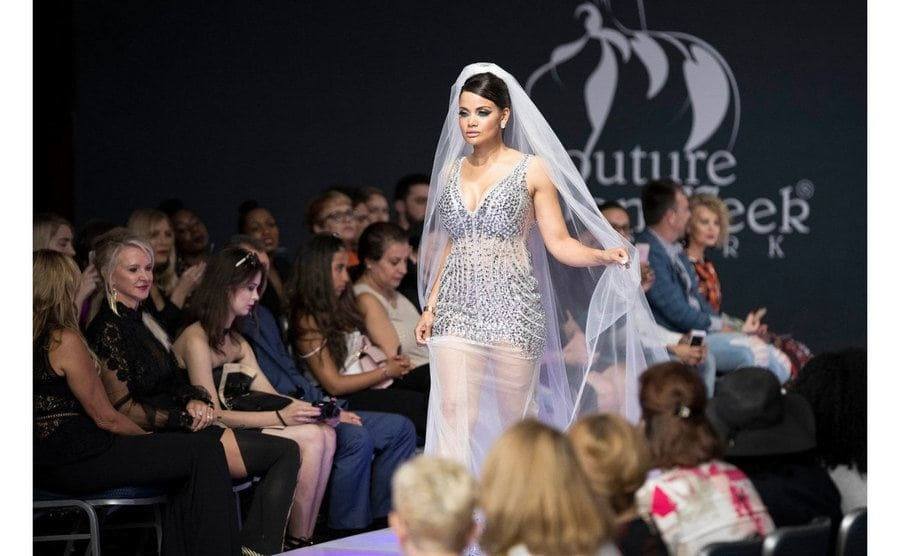 Samantha Sepulveda walks the runway during New York Fashion Week.