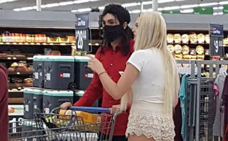 A Michael Jackson look-a-like is seen shopping 