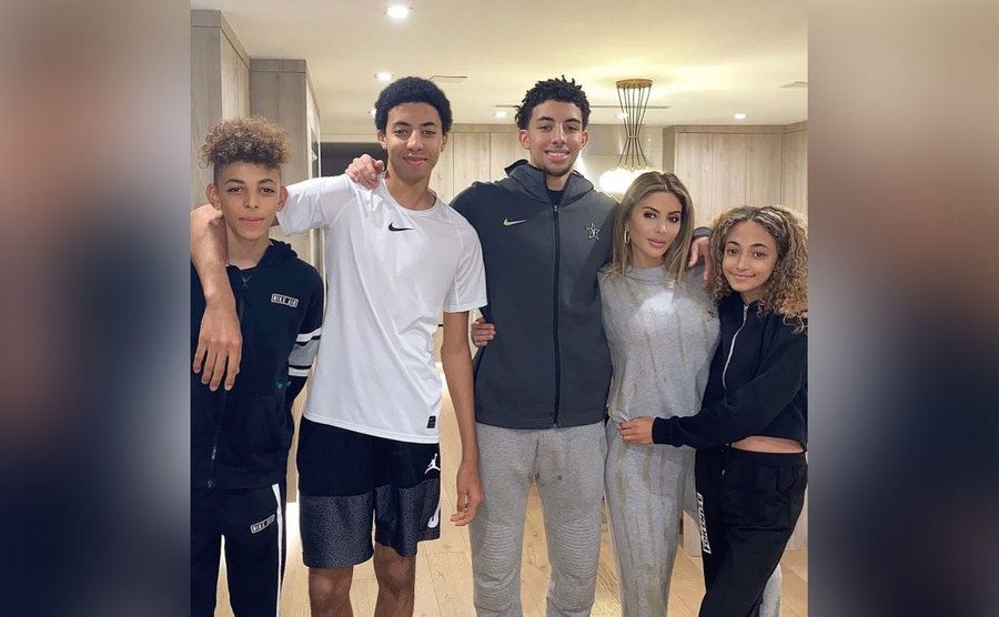 Larsa takes a photo with her kids at home. 